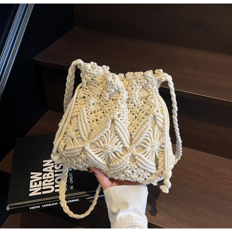 Seaside vacation wind rope woven bag women's 2025 spring and summer new beach bag crossbody bucket bag woven bag