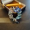 Elegant Rhinestone Animal Brooch: High-End Flower Design for Women's Coats and Accessories