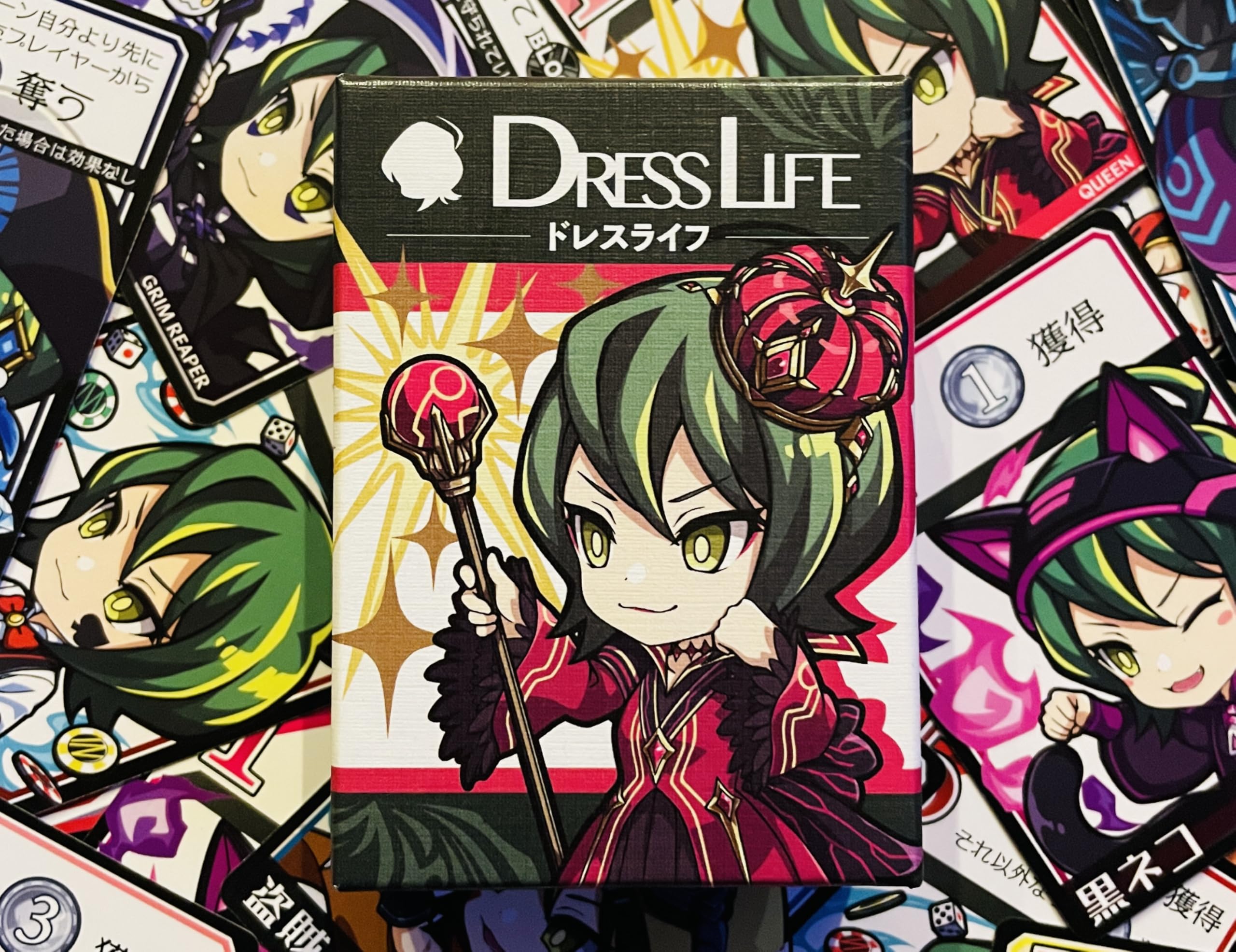 

DRESSLIFE, a strategy card game for 2-6 players, ages 8 and up, 15-20 minutes of playtime