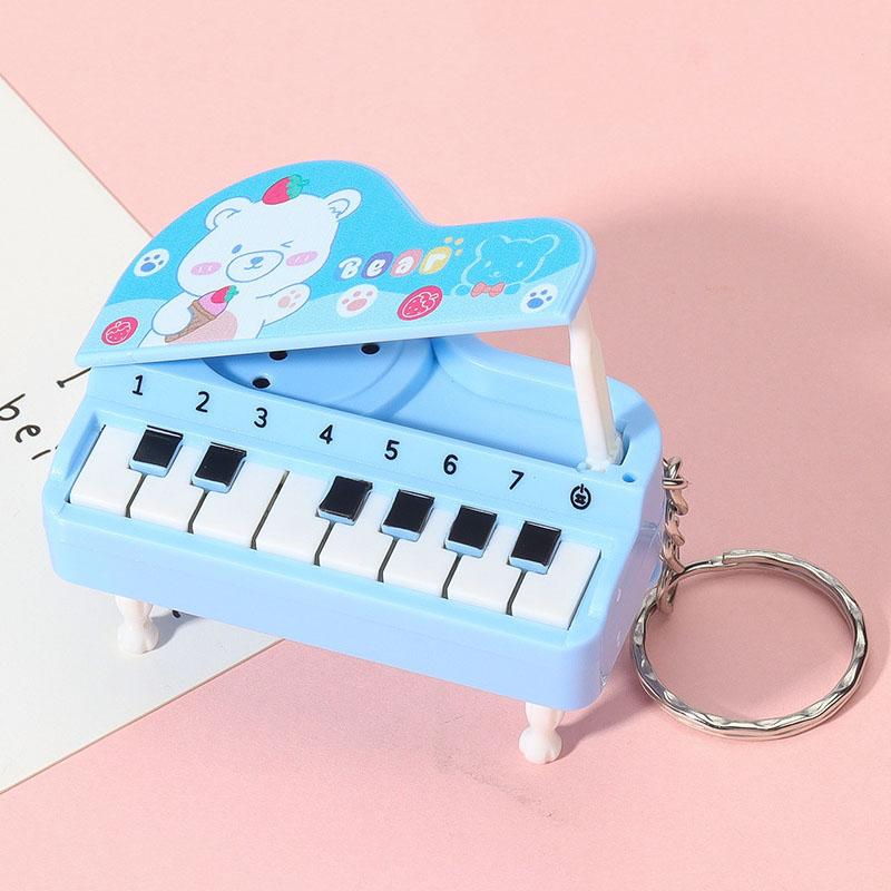 Mini Piano de Bureau Porte-clés Mignonne Machine de Jeu Musical Pendentif Coloré pour Sac Jouet Éducatif pour Enfants Cadeau de Pâques bleu