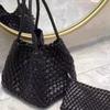 Niche Handmade Woven Dumpling Bag: 2025 High-End Drawstring Handbag & Mother-Child Market Bag
