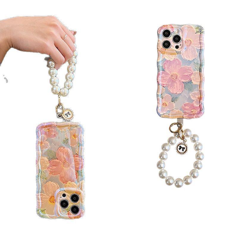 Artistic Oil Painting Flower Phone Case for iPhone 17 Pro Max/14, with 16E Bracelet and Blue Light Filter.