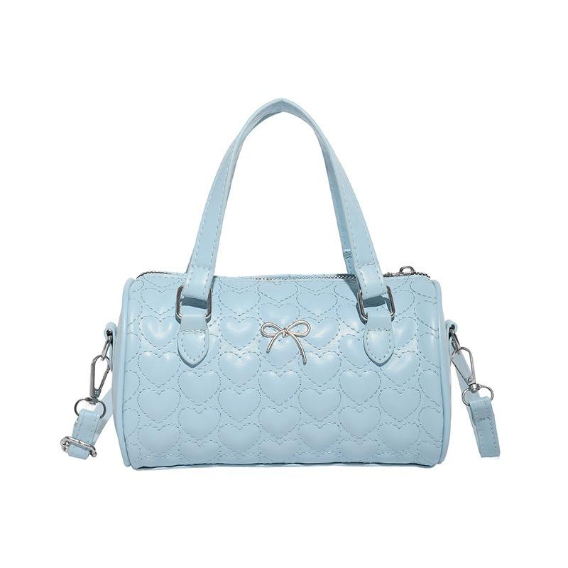 New summer popular casual and beautiful fresh solid color bow cylinder bag portable shoulder messenger bag women's bag