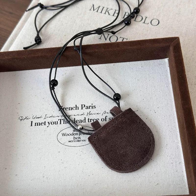 

Портативная кожаная сумка-ожерелье в крутом стиле для Bluetooth-гарнитуры, очков, ключей