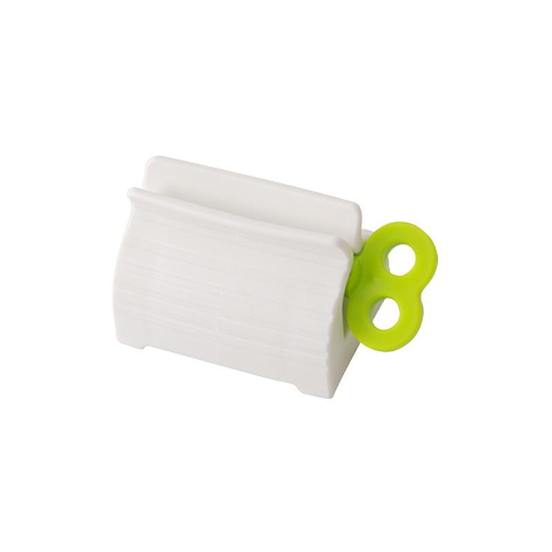 

Toothpaste Holder Dispenser Manual Lazy Bathroom Accessories Rolling Tube Toothpaste Squeezer Press Dispensador De Pasta Dental зелёный