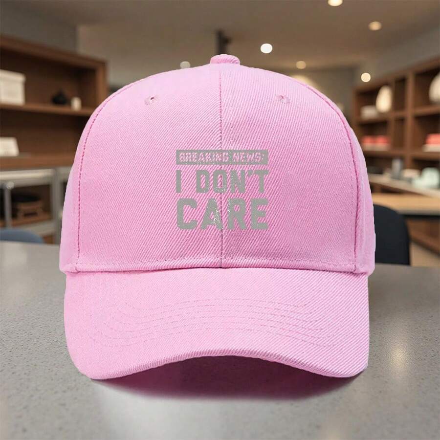 Red Adjustable Baseball Cap With Printed Breaking News: I Dont Care Text