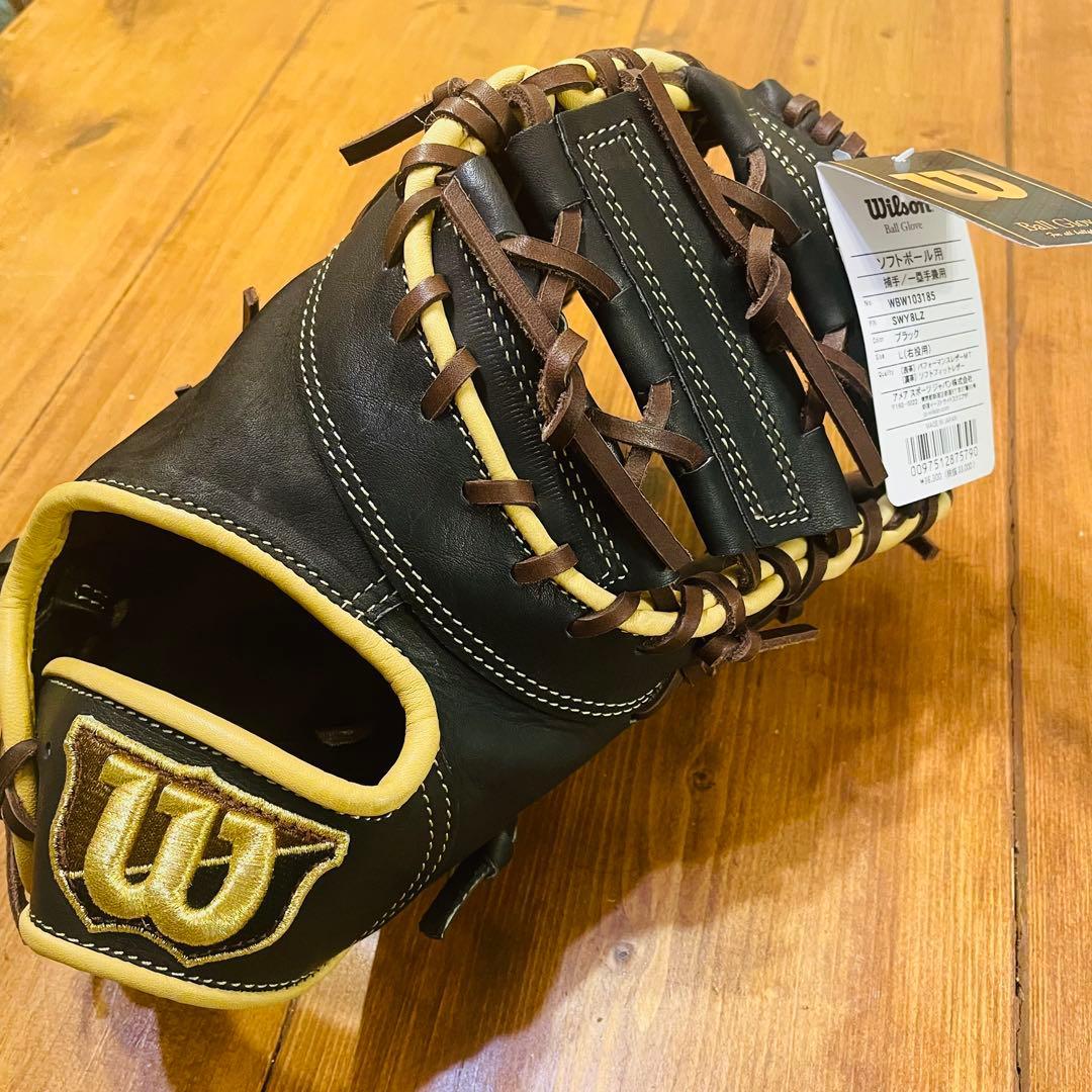 Used [New and unused] Wilson softball glove for both catcher and first baseman with tag
