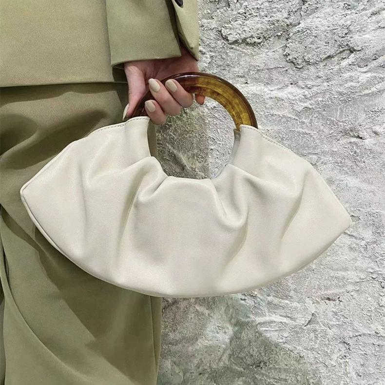 

Internet-famous Same Style Round Handheld Bag 2026 Popular Retro Canvas Cowhide Bag High-end Lightweight Stylish Drawstring Bag 37x6x11cm білий