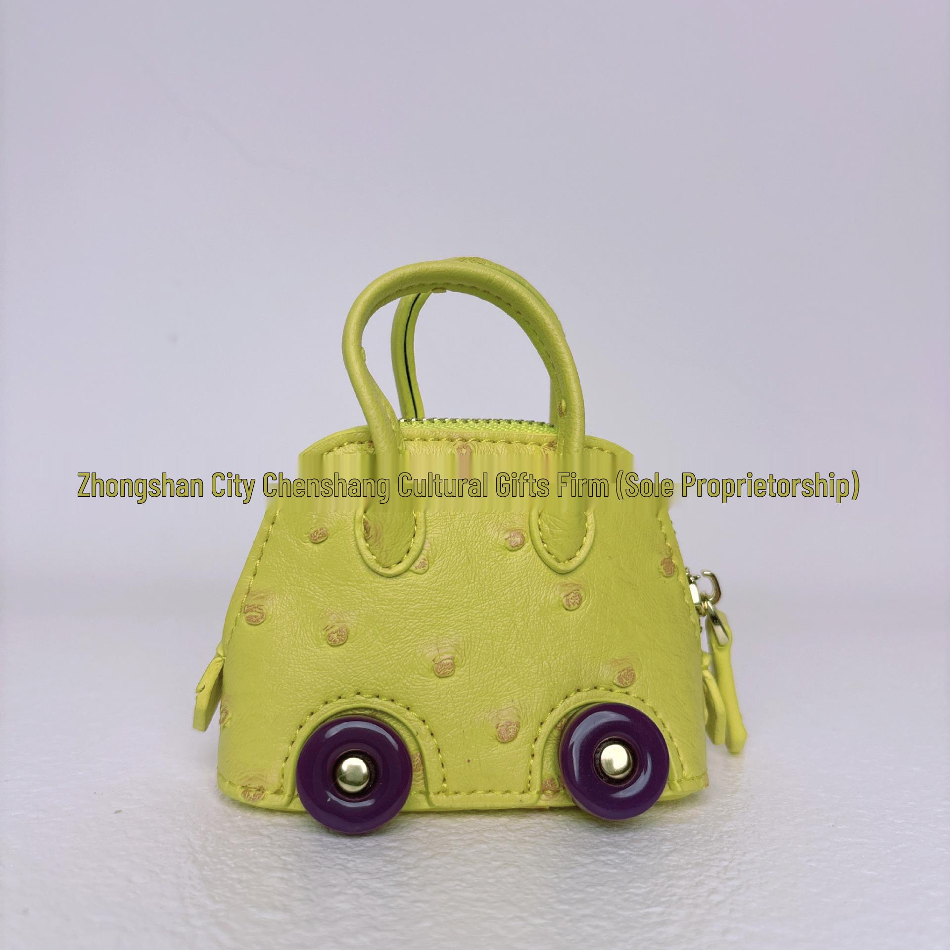 

Мини-сумка на колесиках с узором под страуса: Держатель для наушников и брелок