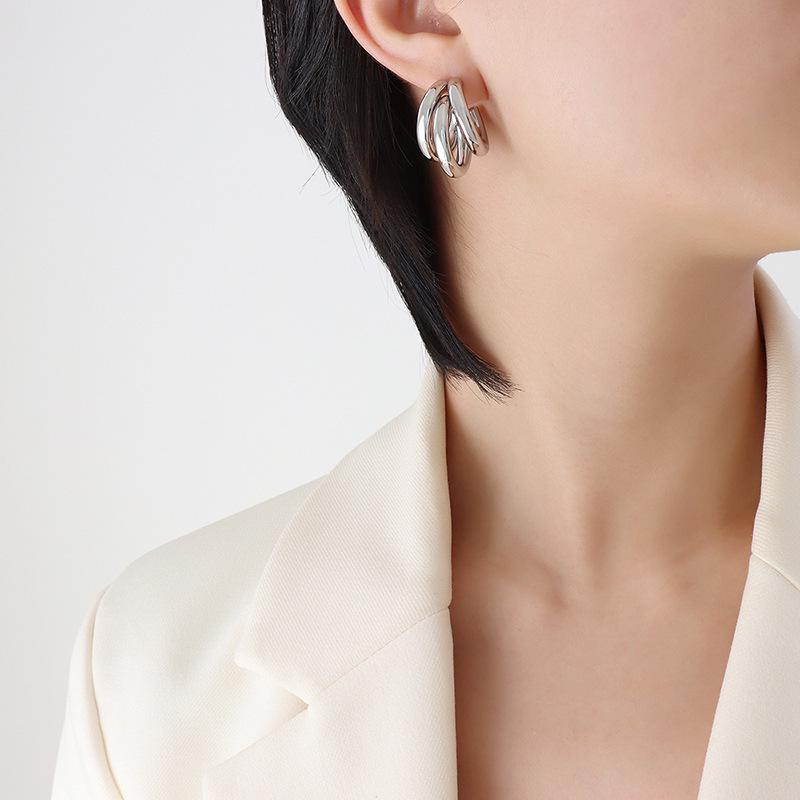 European-Inspired Trendy Triple-Layer C-Shaped Hollow Gold-Plated Titanium Earrings.