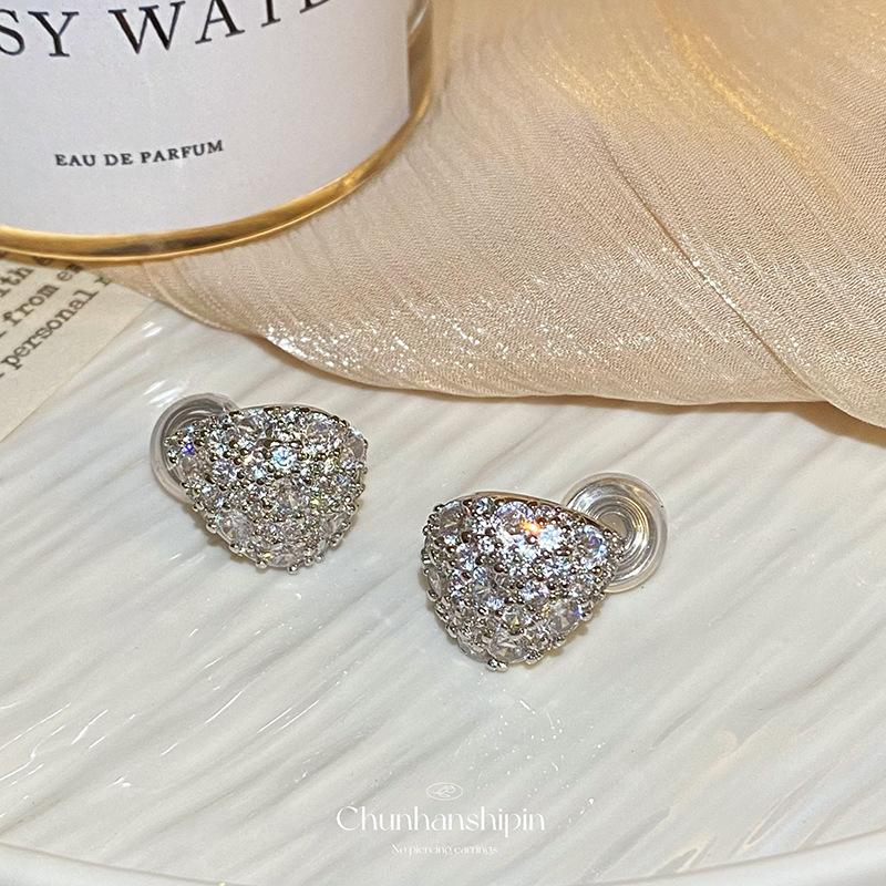 

Gypsy stars, shiny zircon water drop ear clips, no ear holes, mosquito coil disc earrings, fashionable light luxury, high-end stud earrings, women
