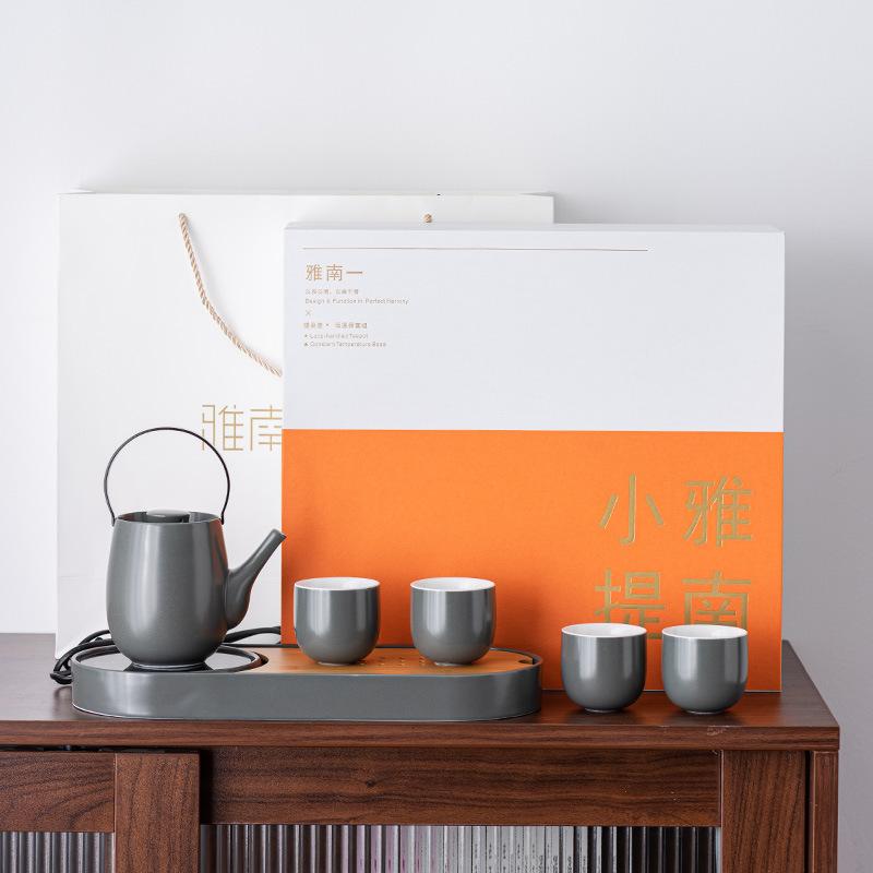 

Легкий роскошный теплый чайный поднос, чайный набор Кунг-фу, подарочный набор высокого класса, чайник с ручкой, один чайник и четыре чашки, памятные деловые подарки