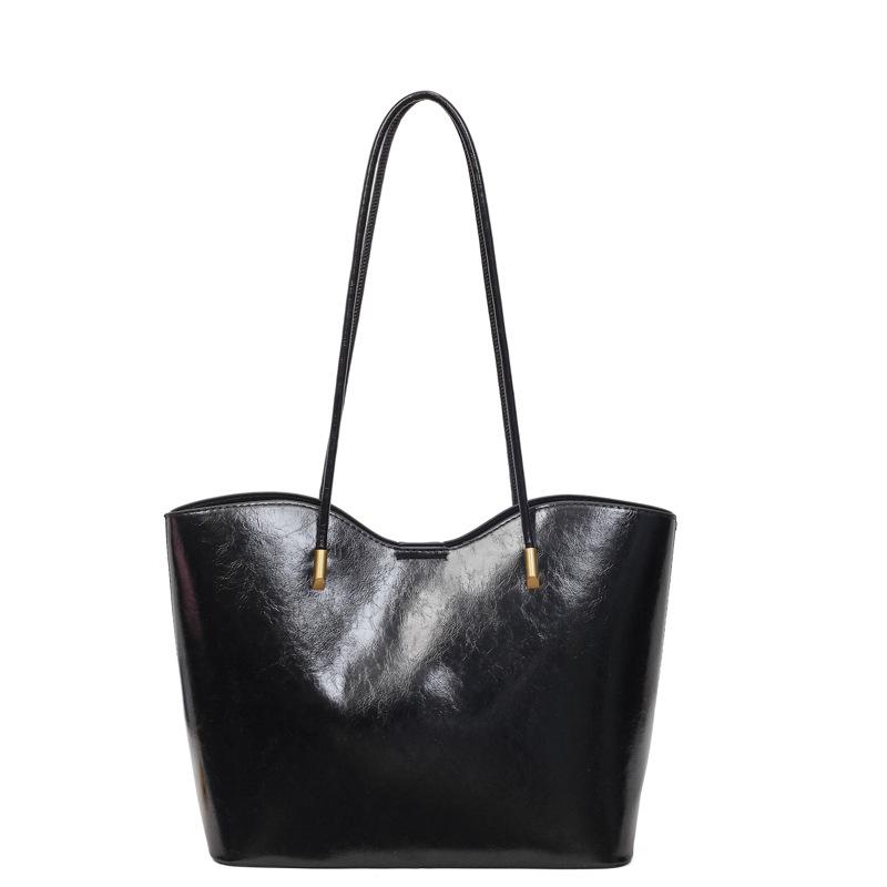 

This year, the versatile tote bucket bag is popular for women, the new texture of the season, the niche personality trend, and the shoulder underarm чёрный