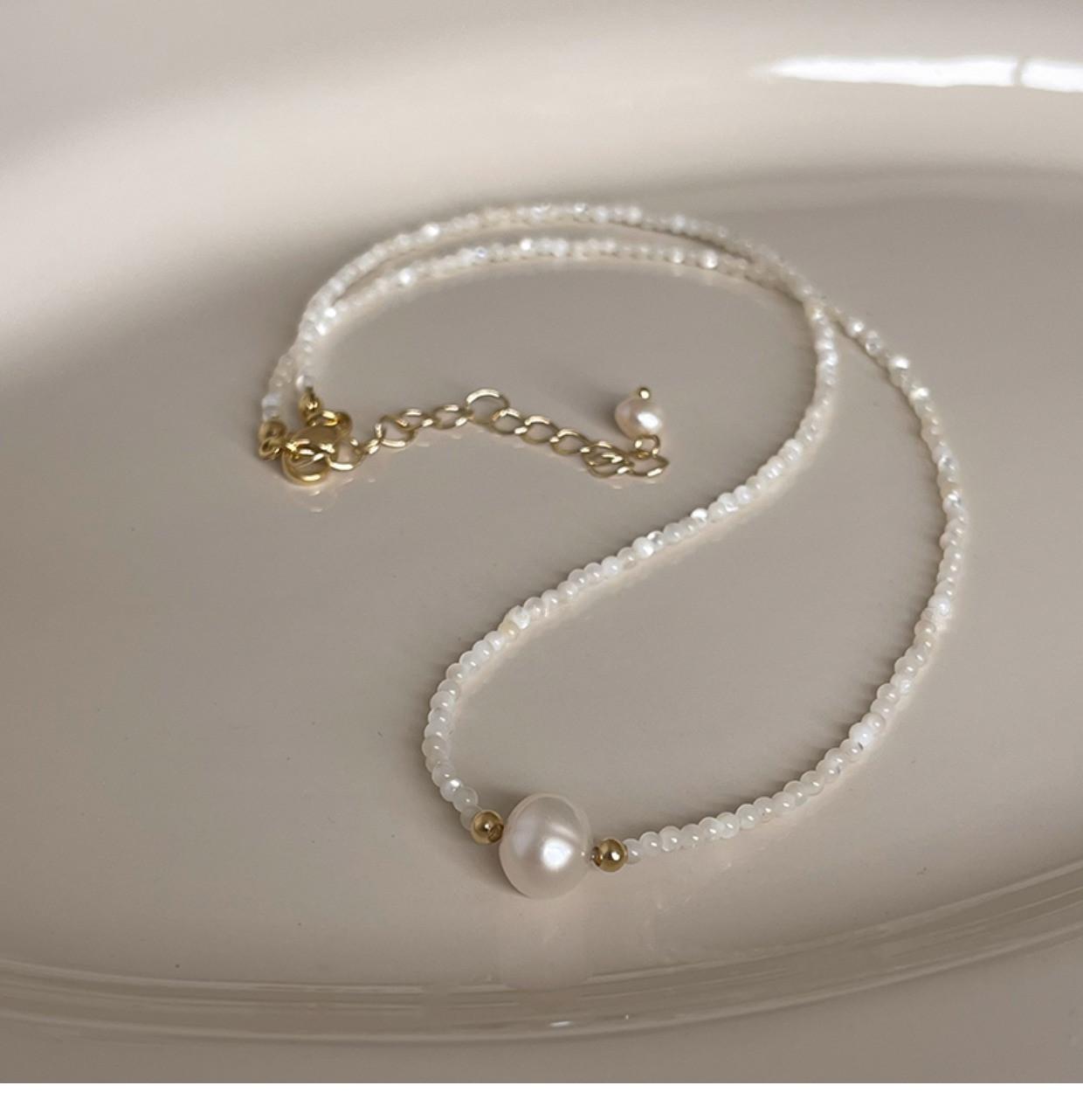 

Жіноча літня мода Намисто на ключицю з прісноводних перлів у формі підкови та равлика - Стиль інфлюенсера Чокер з ракушок.
