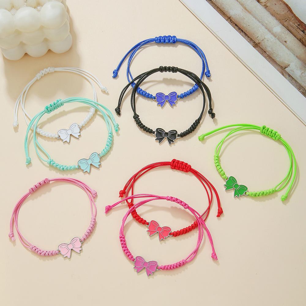 Popular hand-woven colored hand rope, alloy drip bow accessories, girlfriend friendship bracelet