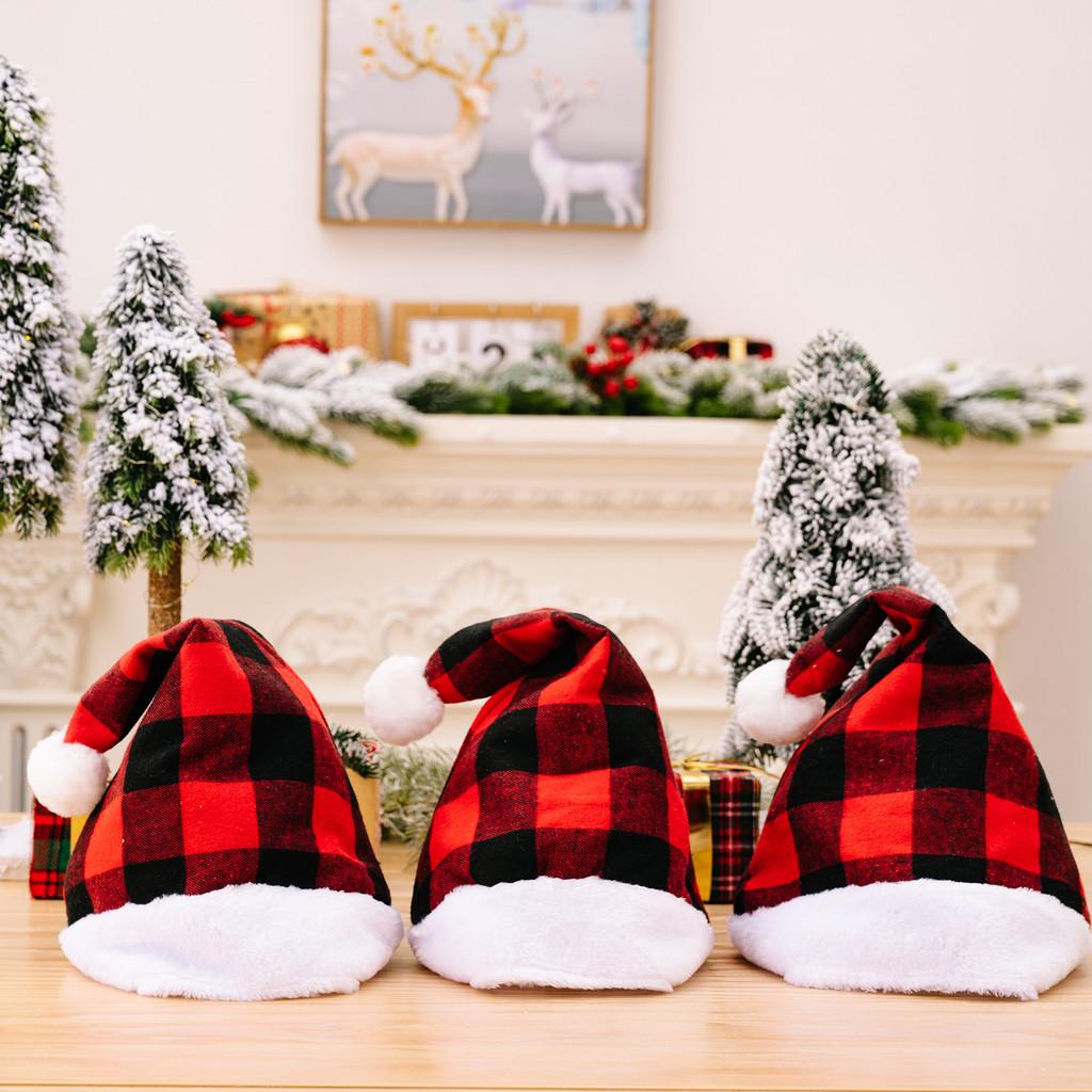 Cozy Red And Black Plaid Christmas Hat With Soft White Fur Pom Poms For Festive Cheer
