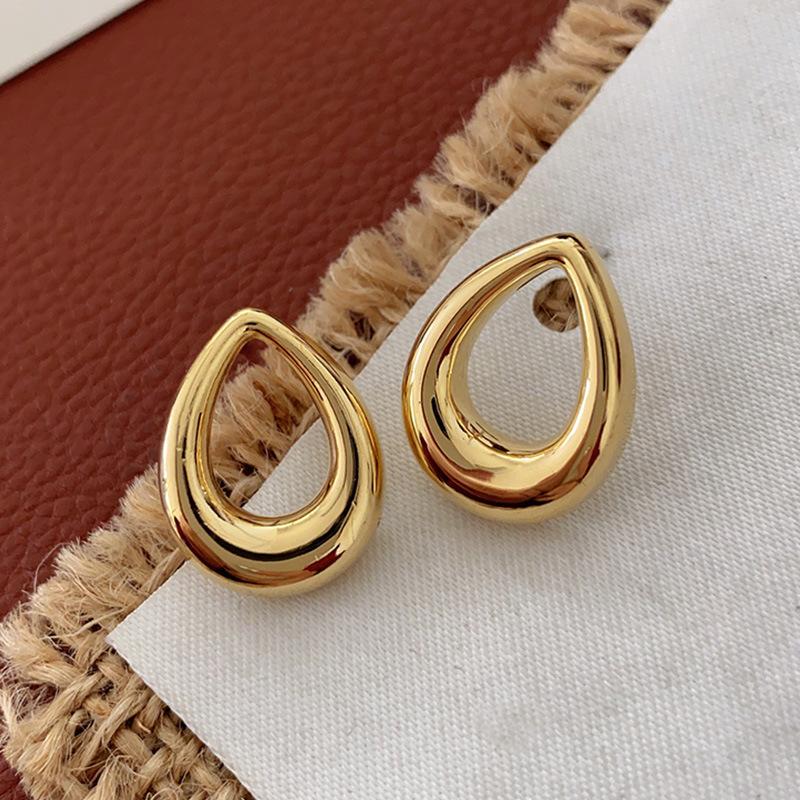 

Серьги-капли из текстурированного металла, легкие роскошные серьги-гвоздики высокого класса, популярные простые и холодные серьги, женские