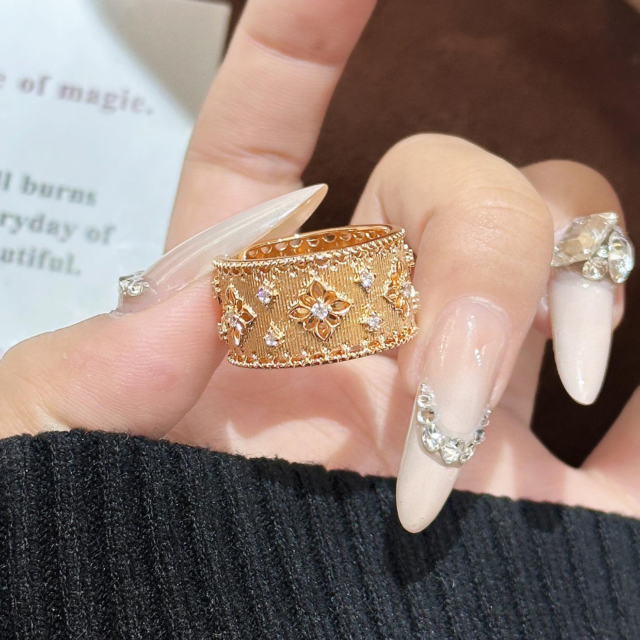 European and American style brushed hollow ring lace inlaid zircon four-leaf clover hollow court style