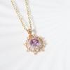 Purple Zirconia Sunburst Pendant Necklace, Golden Tone Sparkly Jewelry for Women