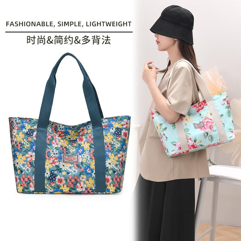 Neue Handtasche mit großem Fassungsvermögen für Damen, Hand-Canvas-Tasche für die Arbeit, Pendler-Damentasche, Muttertasche, bedruckte Umhängetasche