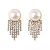 Pendientes de perlas de alta gama de moda Pendientes retro de nicho francés de lujo ligero Pendientes de perlas simples y versátiles para mujer
