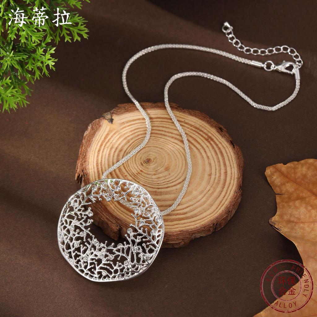 New round hollow irregular coral pendant women's high sense diamond-set geometric coral necklace