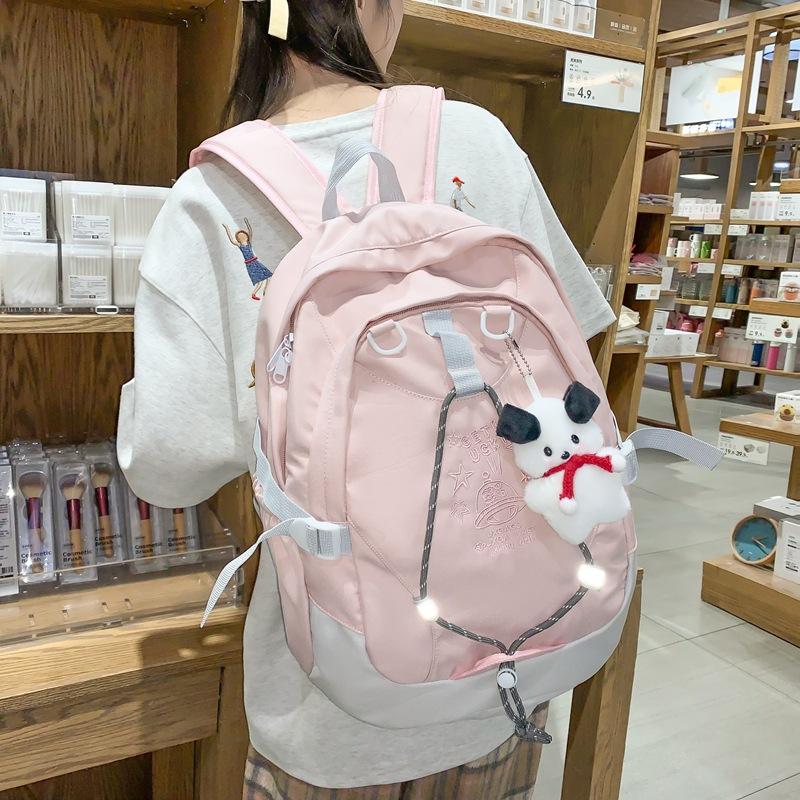 College style drawstring large-capacity student schoolbag spring 2023 new printed shoulder backpack with pendant