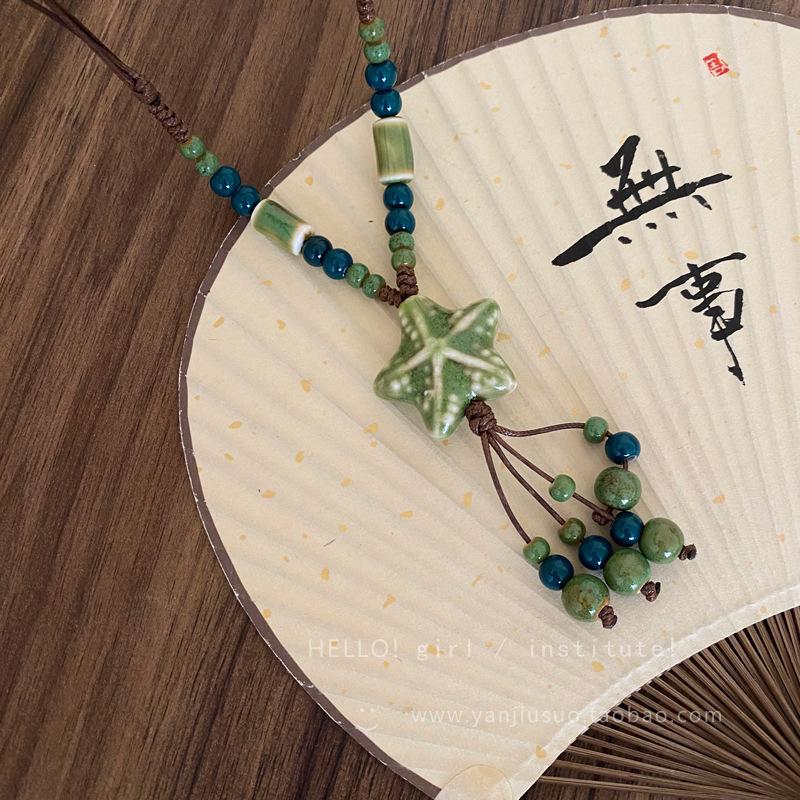 Retro Chinese Tassel Necklace: Unique Ethnic Style Women's High-End Clavicle Chain.