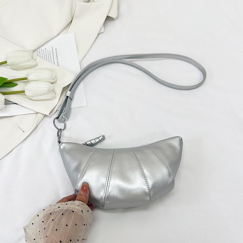 

Korean niche simple shoulder bag women s 2024 summer new casual simple messenger dumpling bag commuter mobile phone bag срібний