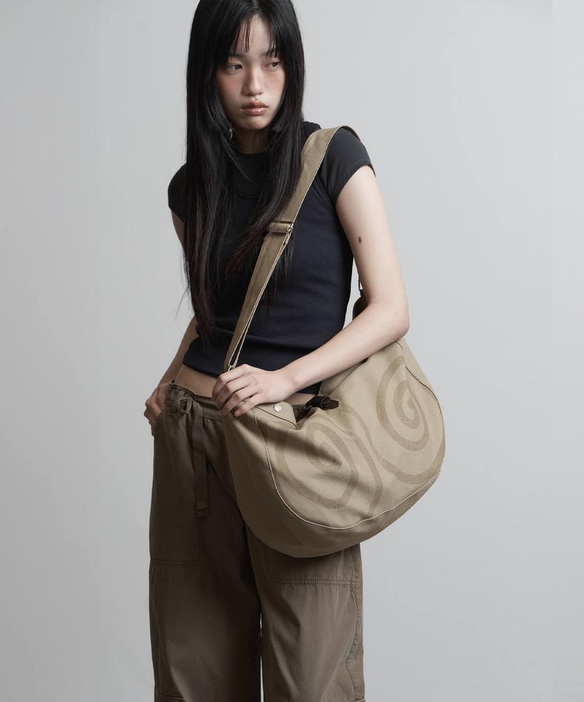 Peanut Loop Spiral Canvas Cross Bag Beige
