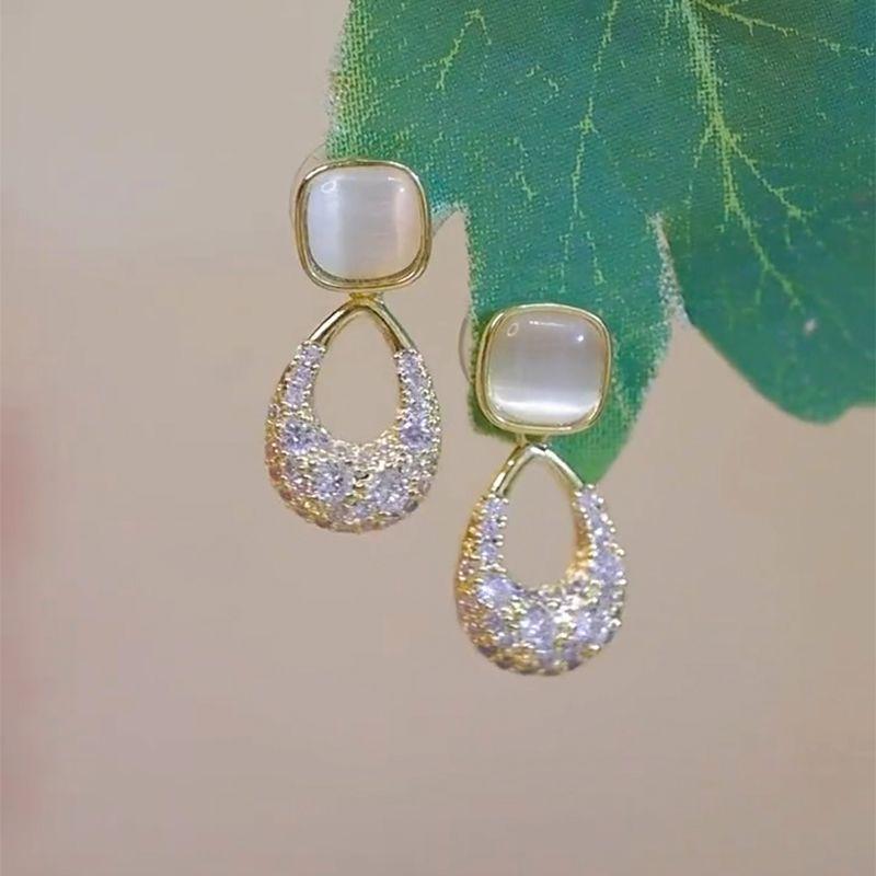 

Нишевый стиль Полностью бриллиантовая опаловая короткая модная игла из серебра 925 пробы Cat s eye stone full diamond drop earrings