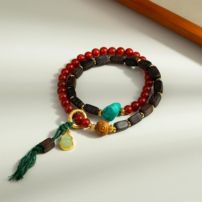 

Изысканный браслет из бусин Дараканского агарового дерева и магнезита - Универсальное ручное украшение