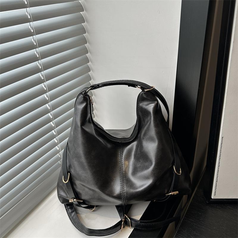 

Retro large-capacity autumn new oilskin tote bag women s solid color casual personality high-grade texture messenger bag чёрный