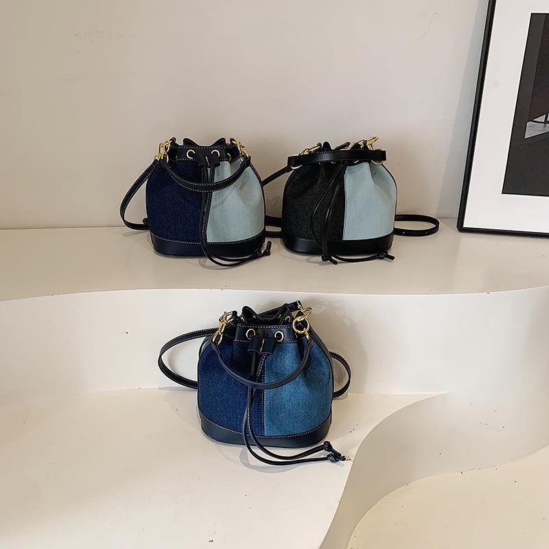 Winter new fashion niche popular contrasting colors pump belt bucket bag versatile portable shoulder women's bag