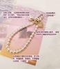 Mobile phone lanyard, portable Chinese style retro pearl bracelet, short wrist rope, handmade beaded round bead keychain hanging.