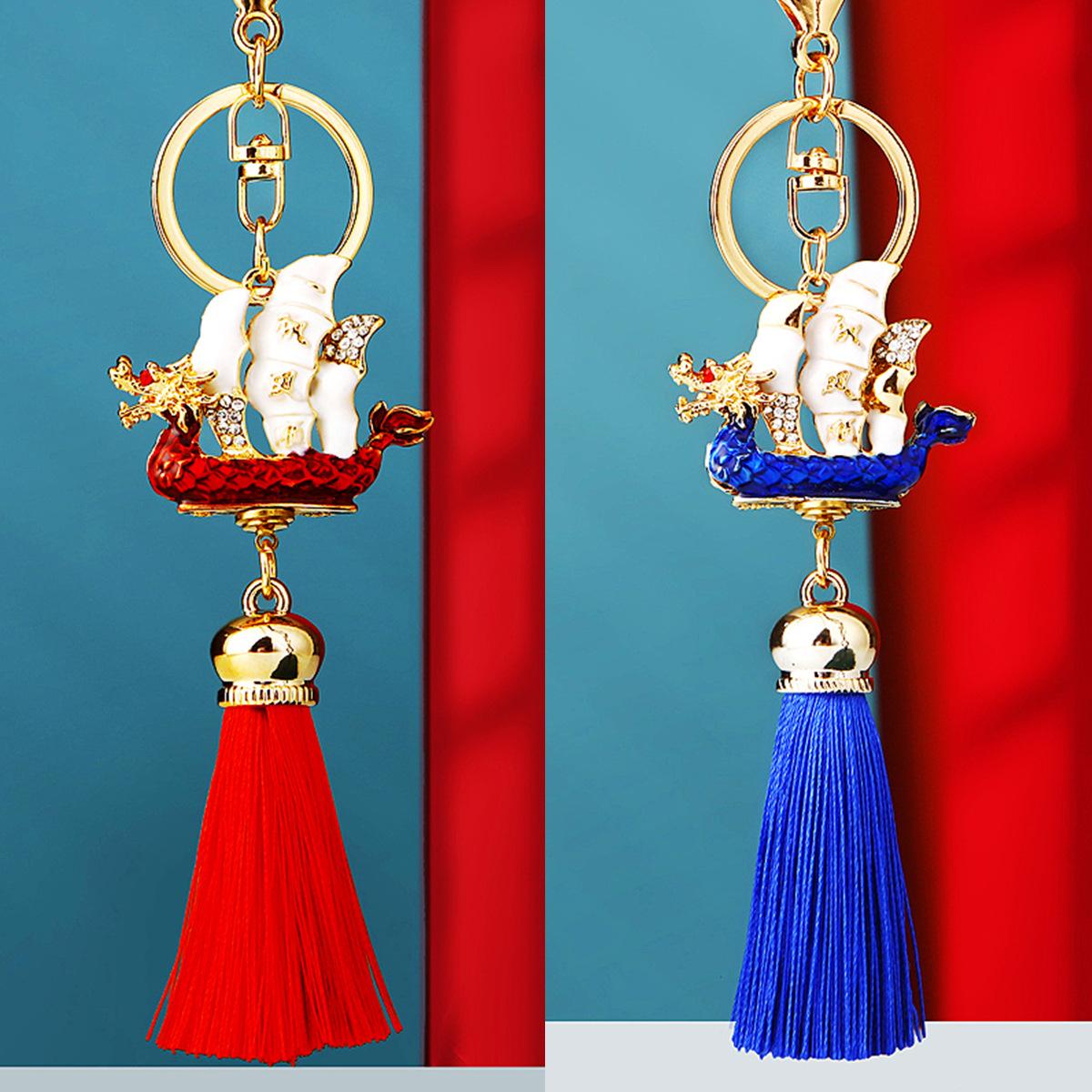 

China-Chic Has A Smooth Sailing Car Key Chain Metal Men and Women s Bag Pendant Key Chain Ring Festive Tassel Pendant Gift синій