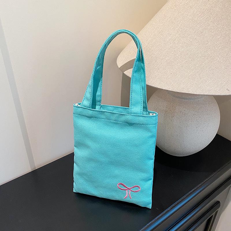 

Dopamine Pastel Bow Canvas Handbag - Cute Embroidered Tote for Phone & Outings синий