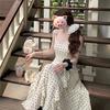 Summer women's new suspender polka dot dress, a complete set of Korean ootd wear and a long dress by the sea