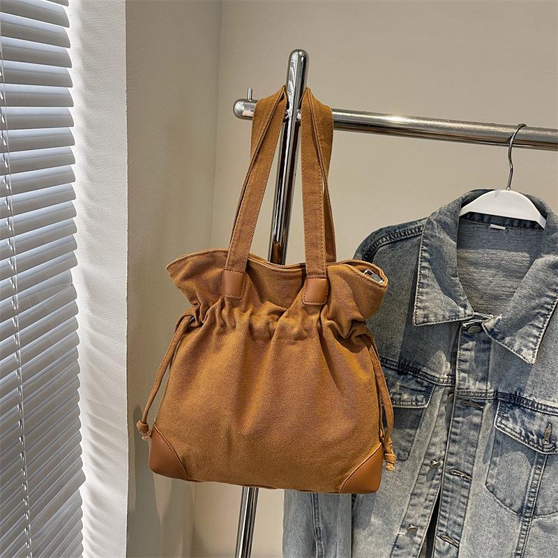 Casual Lazy Wind Simple Capacity Canvas Bag Women 2025 New Simple Korean Version Versatile Shoulder Bucket Bag