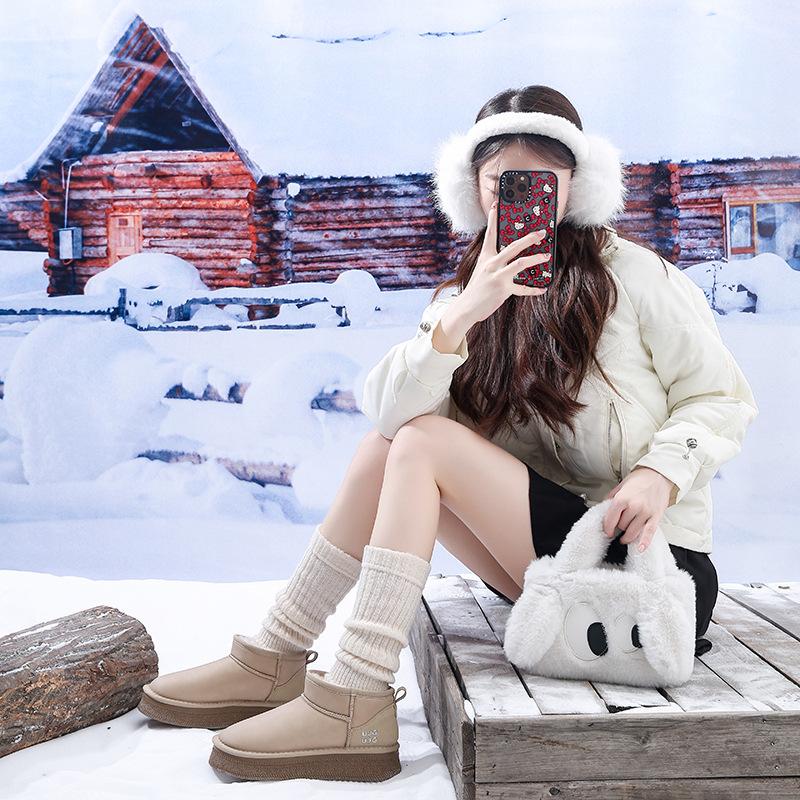 Internet celebrities with the same short tube warm snow boots women's tide year winter new thick-soled velvet short boots Northeast cotton shoes