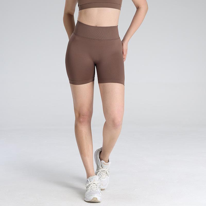 European and American seamless peach hip yoga shorts women's high waist hip lift sports leggings running fitness three-point pants