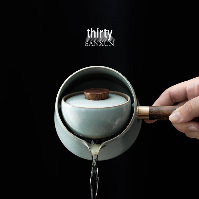 

San Xun Ru Kiln Rotating Automatic Ceramic Tea Set