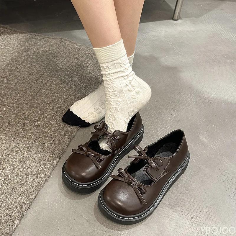 Sapatos de salto alto com laço francês Sapatos de couro de sola grossa para senhoras 2025 Sapatos Mary Jane estilo britânico Bico redondo cor sólida scarpins femininos