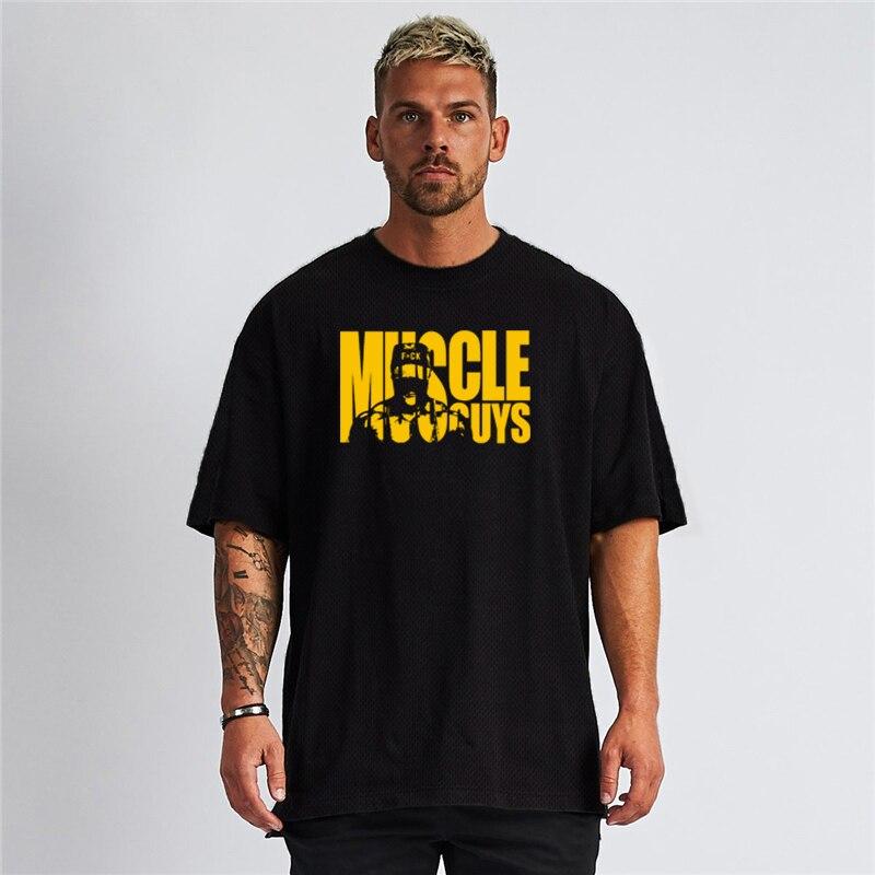 Muscleguys Summer Short Sleeved Men's Fitness Loose T-shirt  Round Neck Quick Drying Half Sleeve