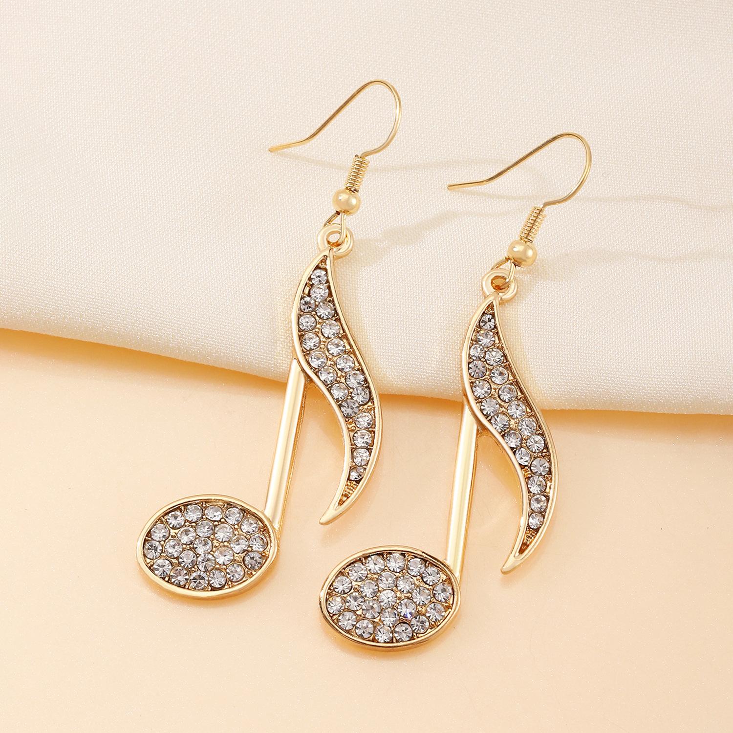 

Charm Temperament Gold Color Zircon Musical Note Drop Dangle Earrings for Women Creative Asymmetry Fashion Stud Jewelry Party