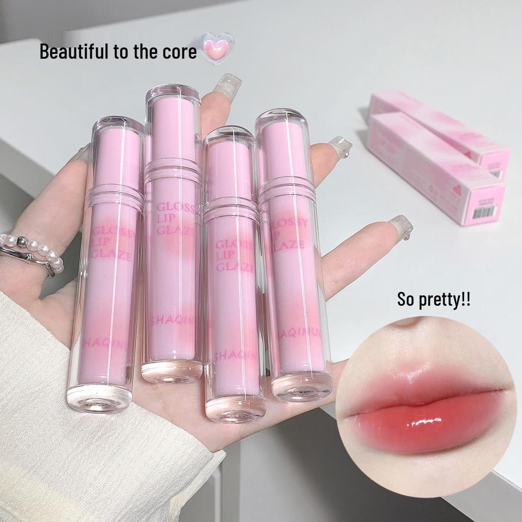 Shaqinuo Moisture-Rich Lip Glaze: Plumps & Enhances Lips with a Natural Shine, Long-Lasting Color, and a Watery Gloss Finish.