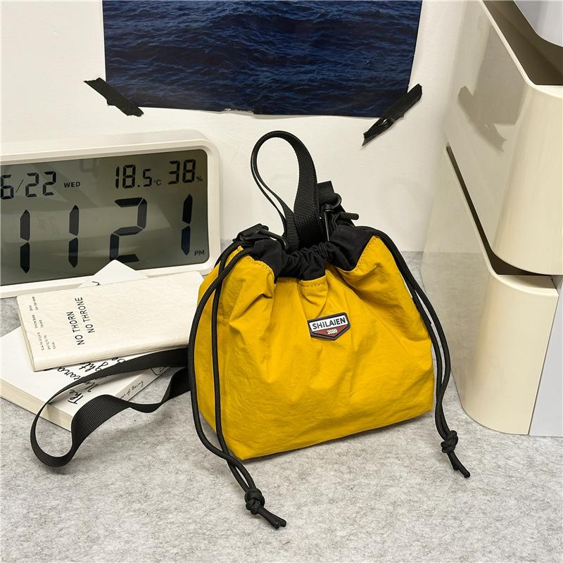Japanese casual oblique span bag 2025 new Korean version fashionable versatile commuter sports small bag tooling shoulder bucket bag