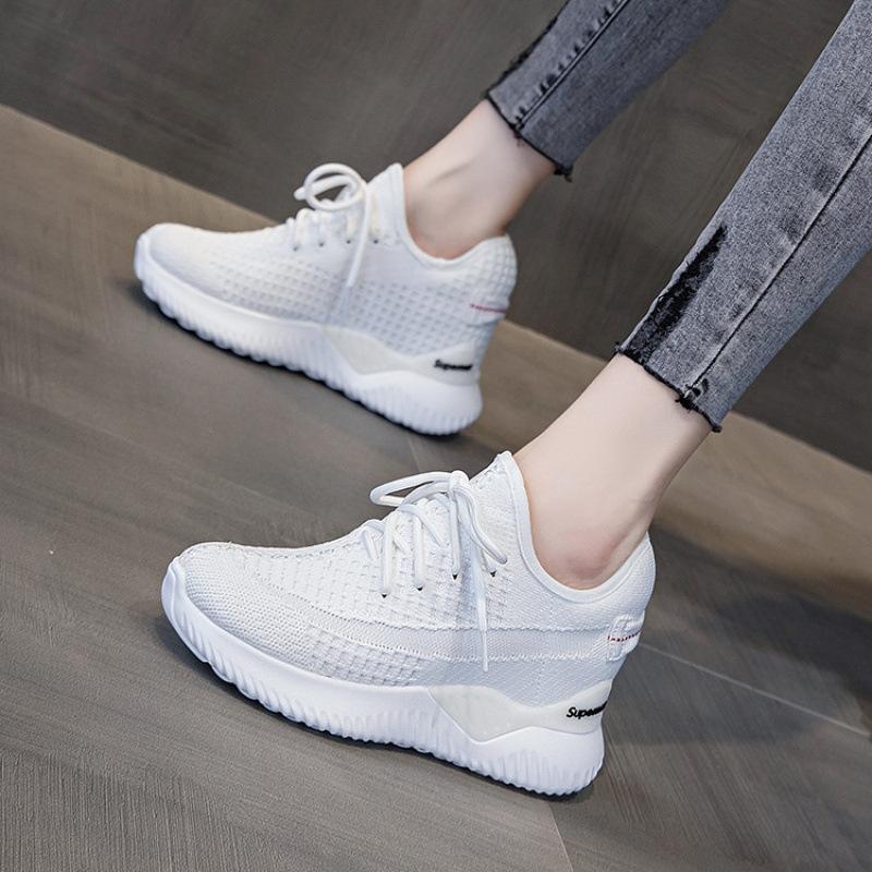 Herfst en winter ademende vlieg-geweven schoenen binnen hoogteverhoging casual antislip veters casual damesschoenen veelzijdige sportschoenen dames