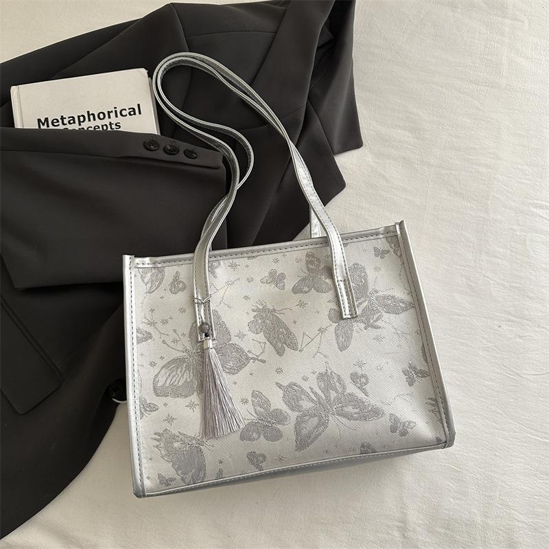 

Женская сумка 2025 новая с принтом большая сумка-тоут большой вместимости портативная на плечо сумка-мессенджер серебряный