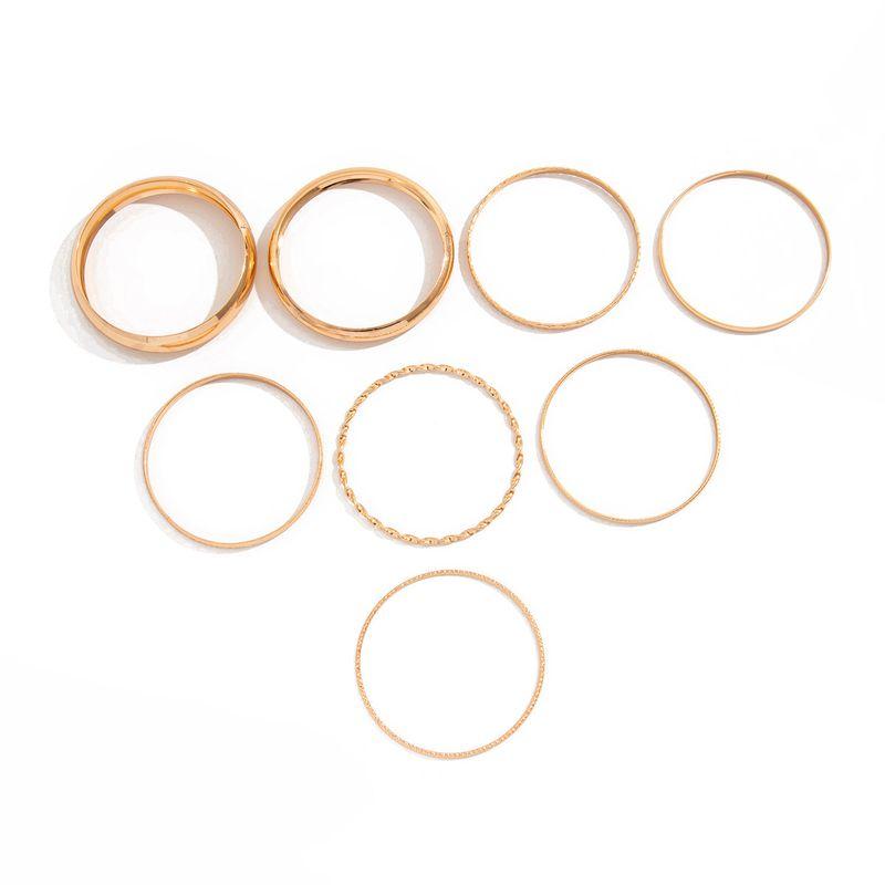 

8-Piece Set of Curved Twist Bracelets, European and American New Style, Unique, Simple, Fashionable, Stackable Bracelet Accessories, Trendy Gold